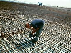 Construction site where reinforced steel is fixed with an automatic rebar tier